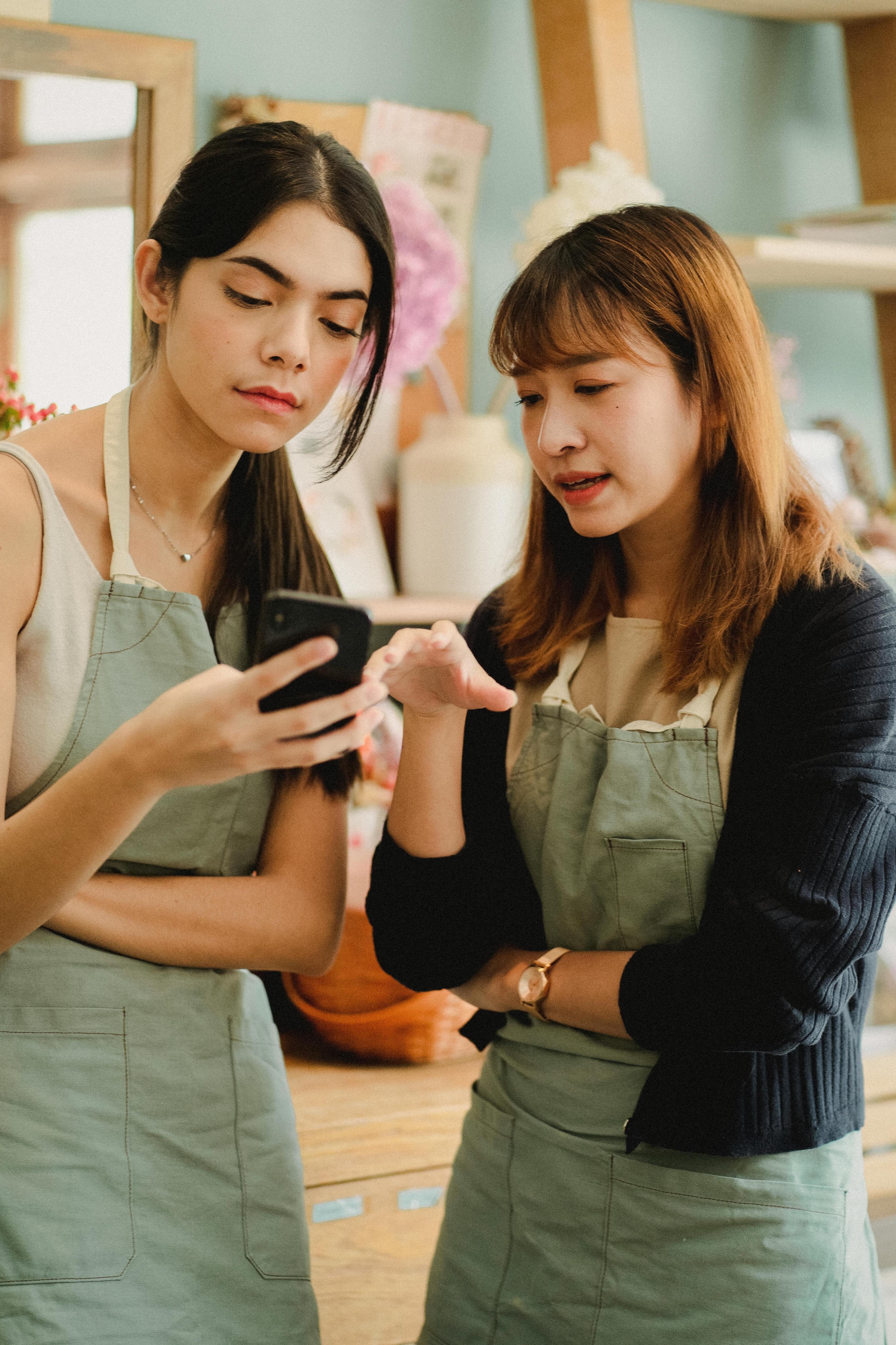 Business owner checking phone